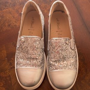 Silver glitter girl flats.